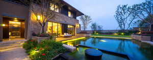 Custom outdoor wireless lighting system with energy efficiency and security